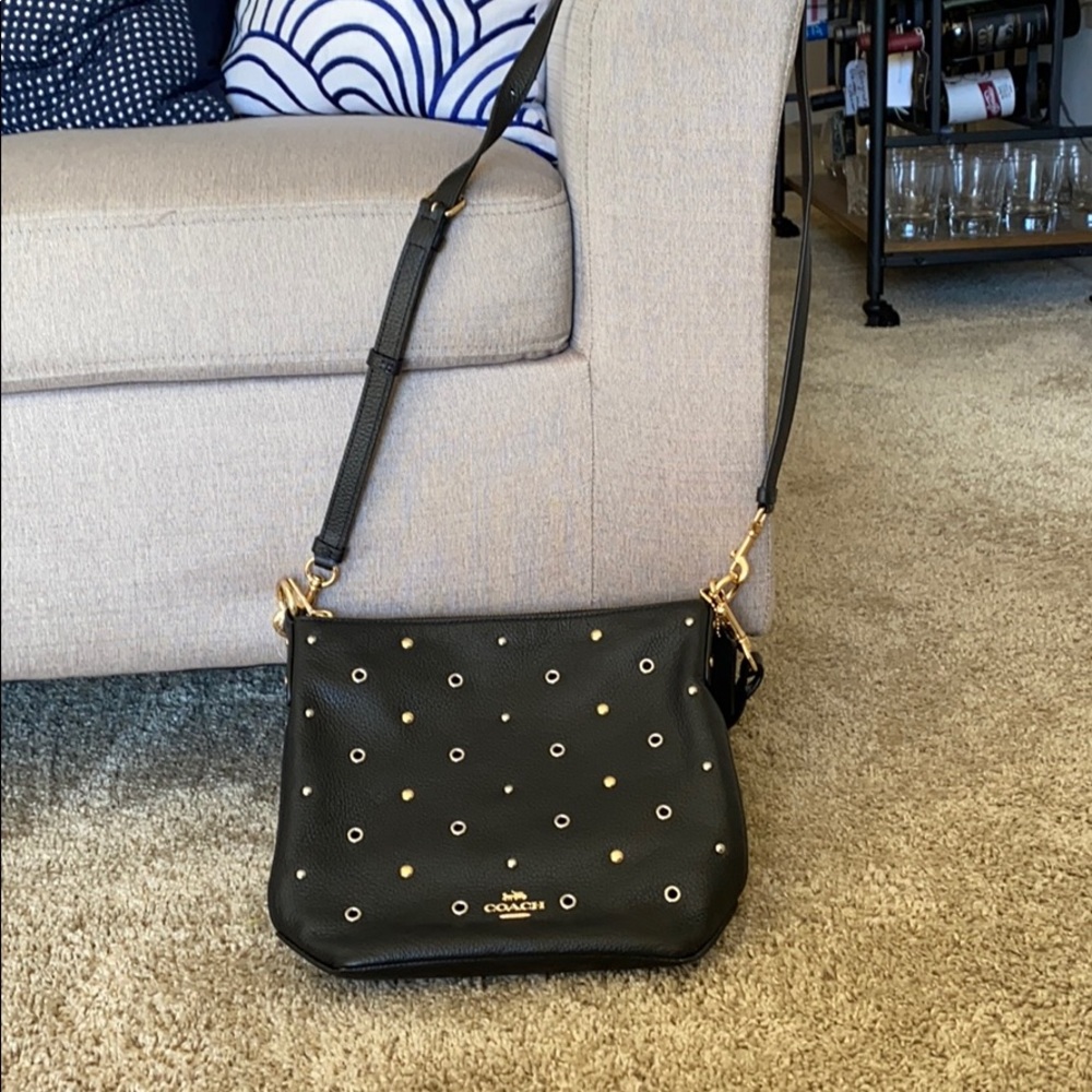 Black and gold Coach crossbody.